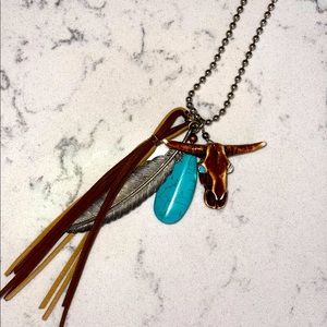 Cow skull // leather tassel // feather chain necklace